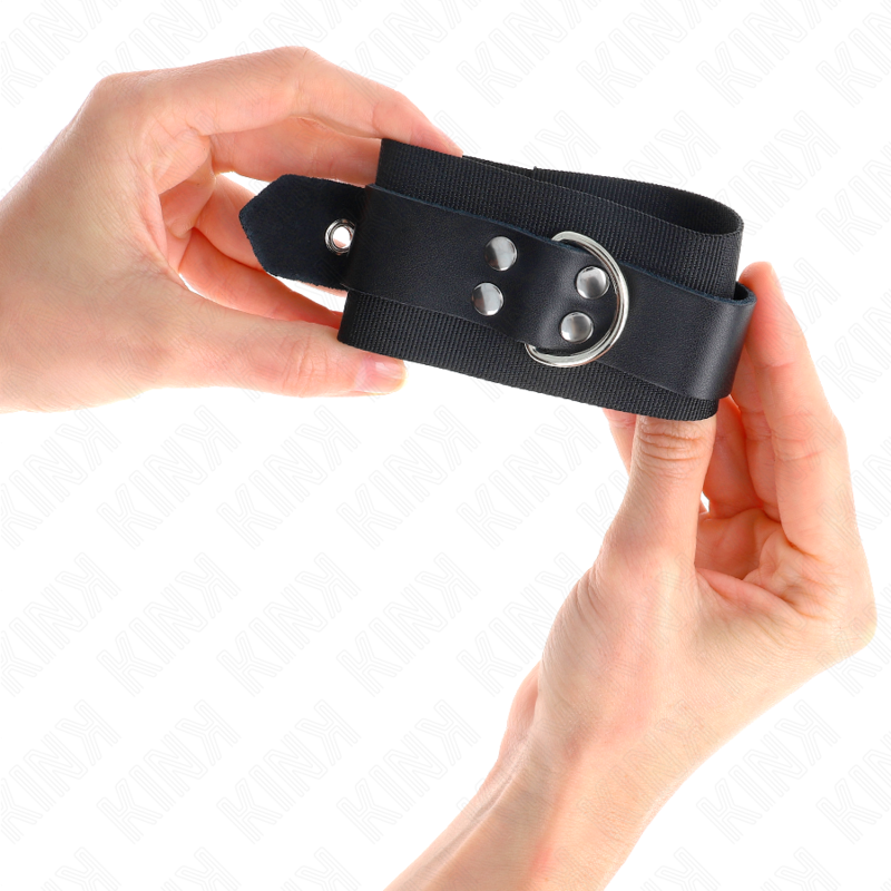 KINK - RESISTENZA DA POLSO IN NYLON NERO CON CINTURA IN PELLE NERA REGOLABILE 19-29 CM X 5,1 CM - Lingerie Harness Boutique | Lingerie Harness Boutique