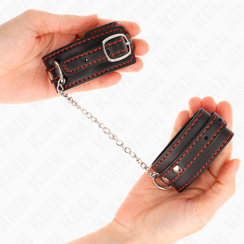 KINK - POTENZIALE DA POLSO PICCOLA NERA CON FODERA ROSSA REGOLABILE 14-24 CM X 3,5 CM - KINK COLLAR & GAG | Lingerie Harness Boutique