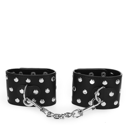 KINK - RESISTENZA DA POLSO CON CHIUSURA A SCATTO COMPLETA DI RIVETTI NERA REGOLABILE 19-24 CM X 5,5 CM - KINK COLLAR & GAG | Lingerie Harness Boutique