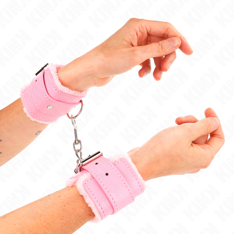KINK - RESISTENZA DA POLSO IMBOTTITA IN PELLICCIA ROSA CON CINTURA ROSA REGOLABILE 17-29 CM X 6 CM - KINK COLLAR & GAG | Lingerie Harness Boutique