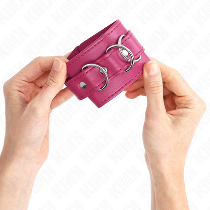 KINK - RESISTENZA DA POLSO CON 3 ANELLI A D REGOLABILE ROSA 17.5-25 CM X 6 CM - Lingerie Harness Boutique | Lingerie Harness Boutique