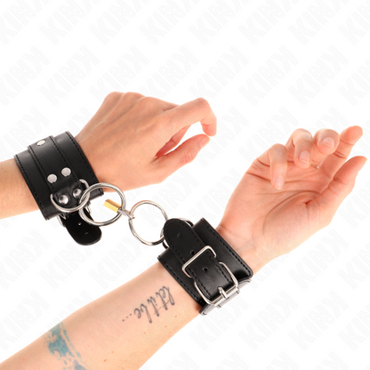 KINK - FERMAPOLSO CON BLOCCAGGIO O-RING NERO REGOLABILE 20-28 CM X 5,5 CM - KINK COLLAR & GAG | Lingerie Harness Boutique