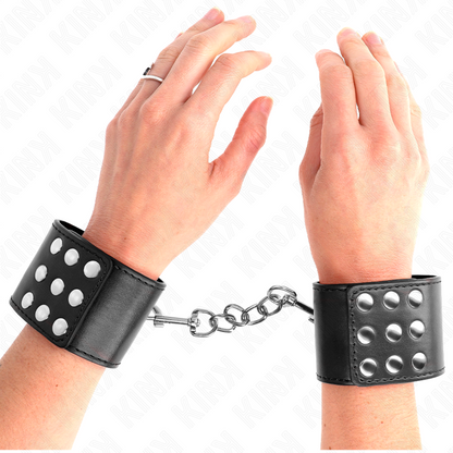 KINK - RESISTENZA DA POLSO CON CHIUSURA A SCATTO NERA REGOLABILE 19-24 CM X 5,5 CM - KINK COLLAR & GAG | Lingerie Harness Boutique