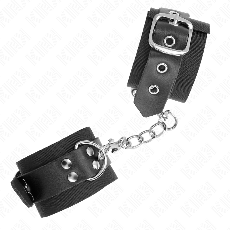 KINK - RESISTENZA DA POLSO IN NYLON NERO CON CINTURA IN PELLE NERA REGOLABILE 19-29 CM X 5,1 CM - KINK COLLAR & GAG | Lingerie Harness Boutique