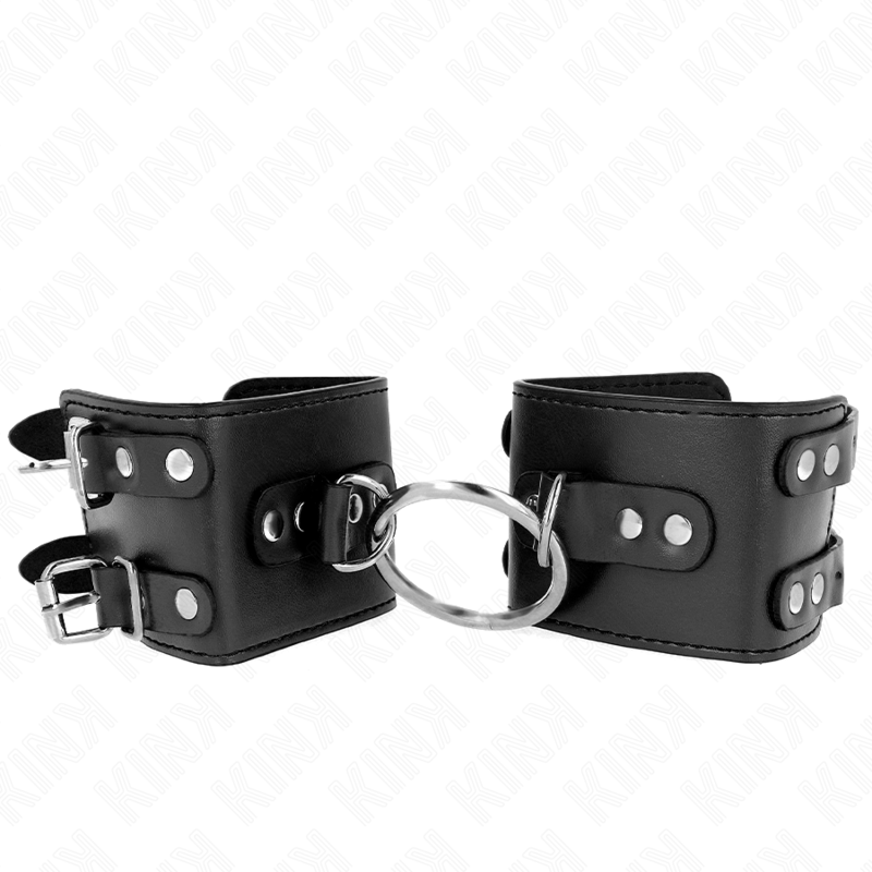 KINK - POLSO FISSO CON ANELLO E BORCHIE REGOLABILE NERO 17-22 CM X 6,5 CM - KINK COLLAR & GAG | Lingerie Harness Boutique
